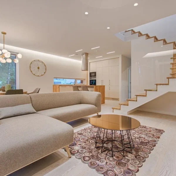Warm minimalist Australian living room with natural timber furniture and soft afternoon light